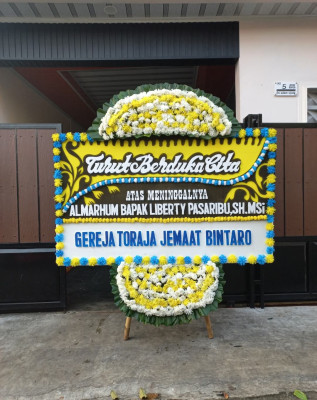 Papan Bunga Duka di Regolwetan